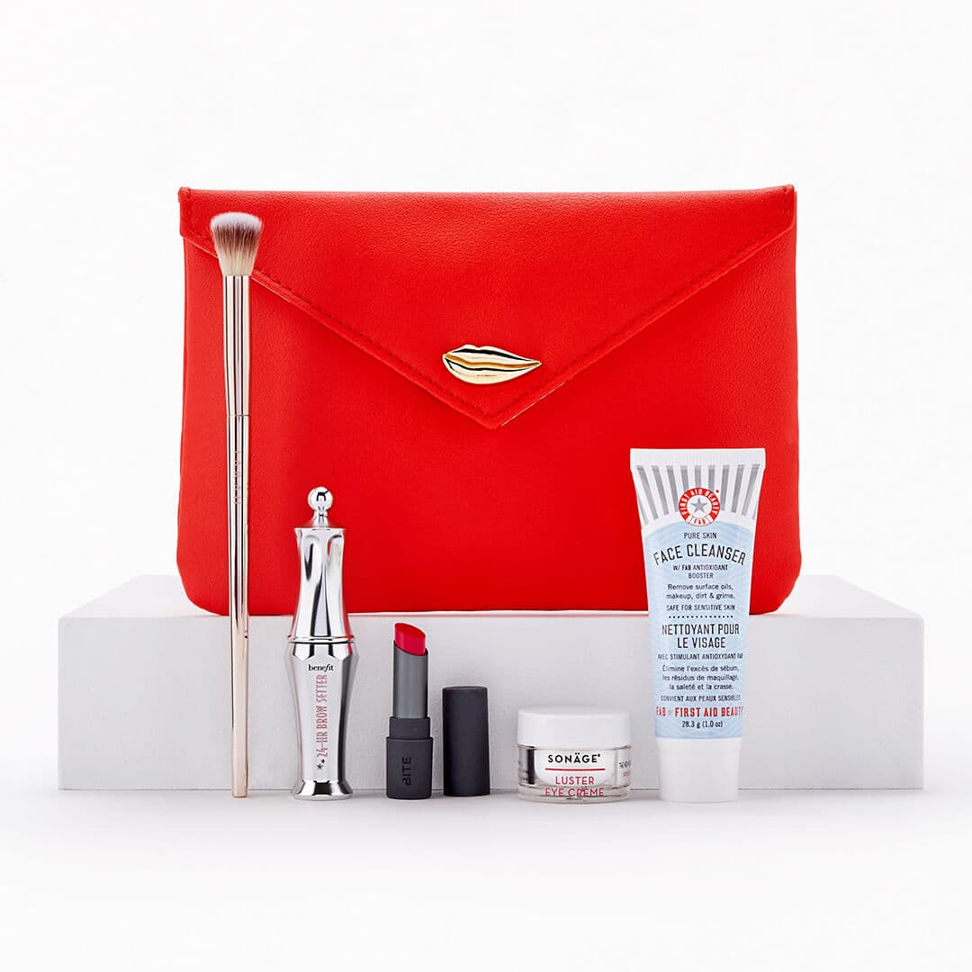 February 2021 Glam Bag and skincare and makeup products and tools on white background