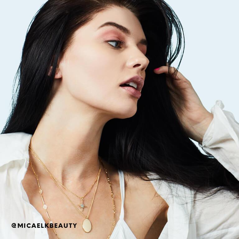 Micaela Klein lets her hair dry after applying leave-in conditioner.