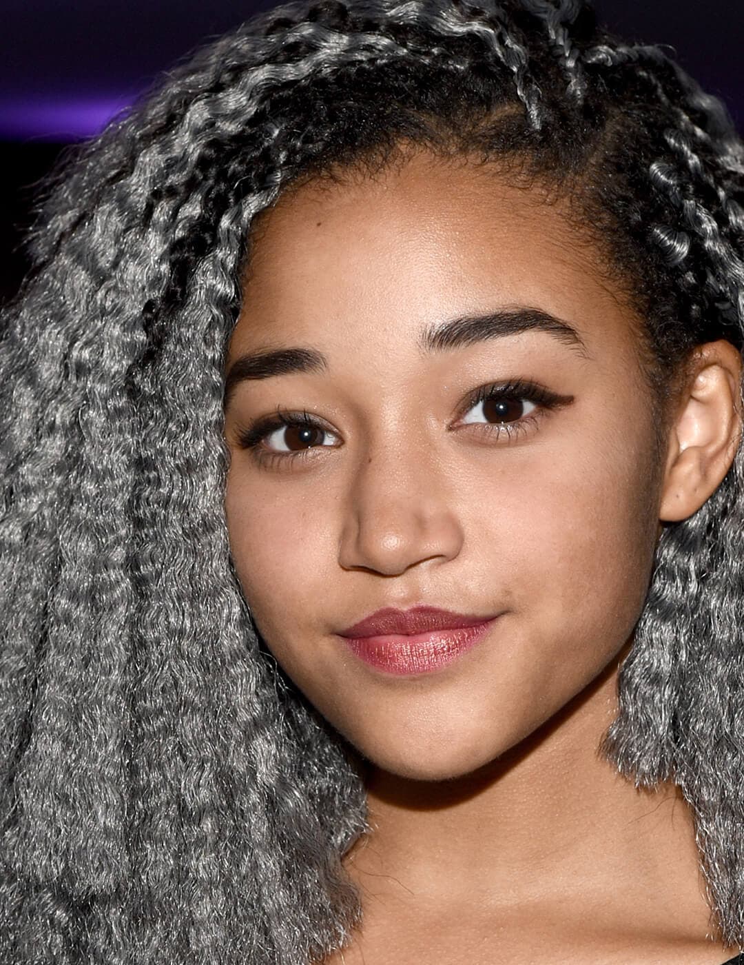 A photo of Amandla Stenberg with a silver accents hairstyle