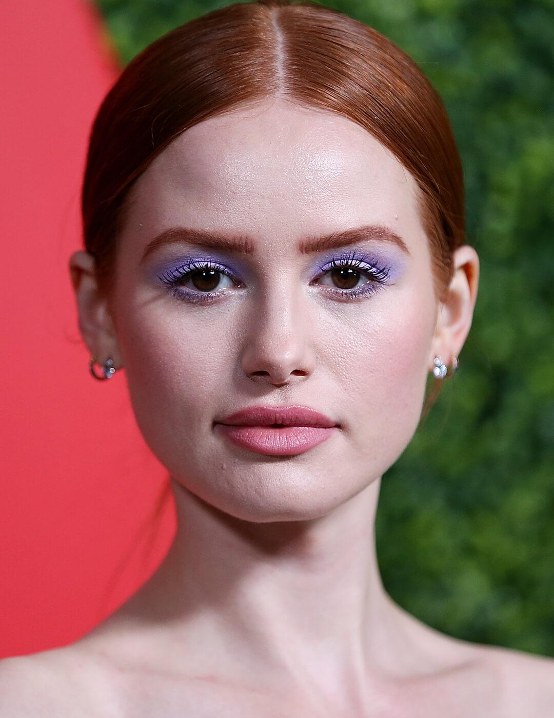Madelaine Petsch rocking lilac eye makeup look paired with nude pink lips