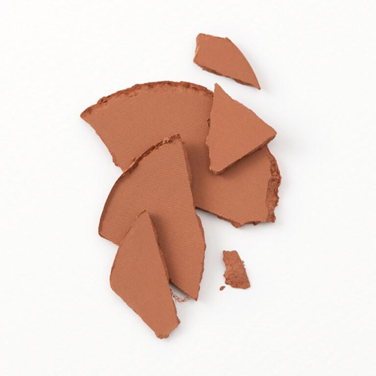 A swatch image of broken compact bronzer makeup