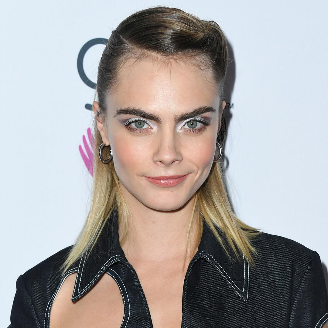 A photo of Cara Delevigne with a natural ombré hair