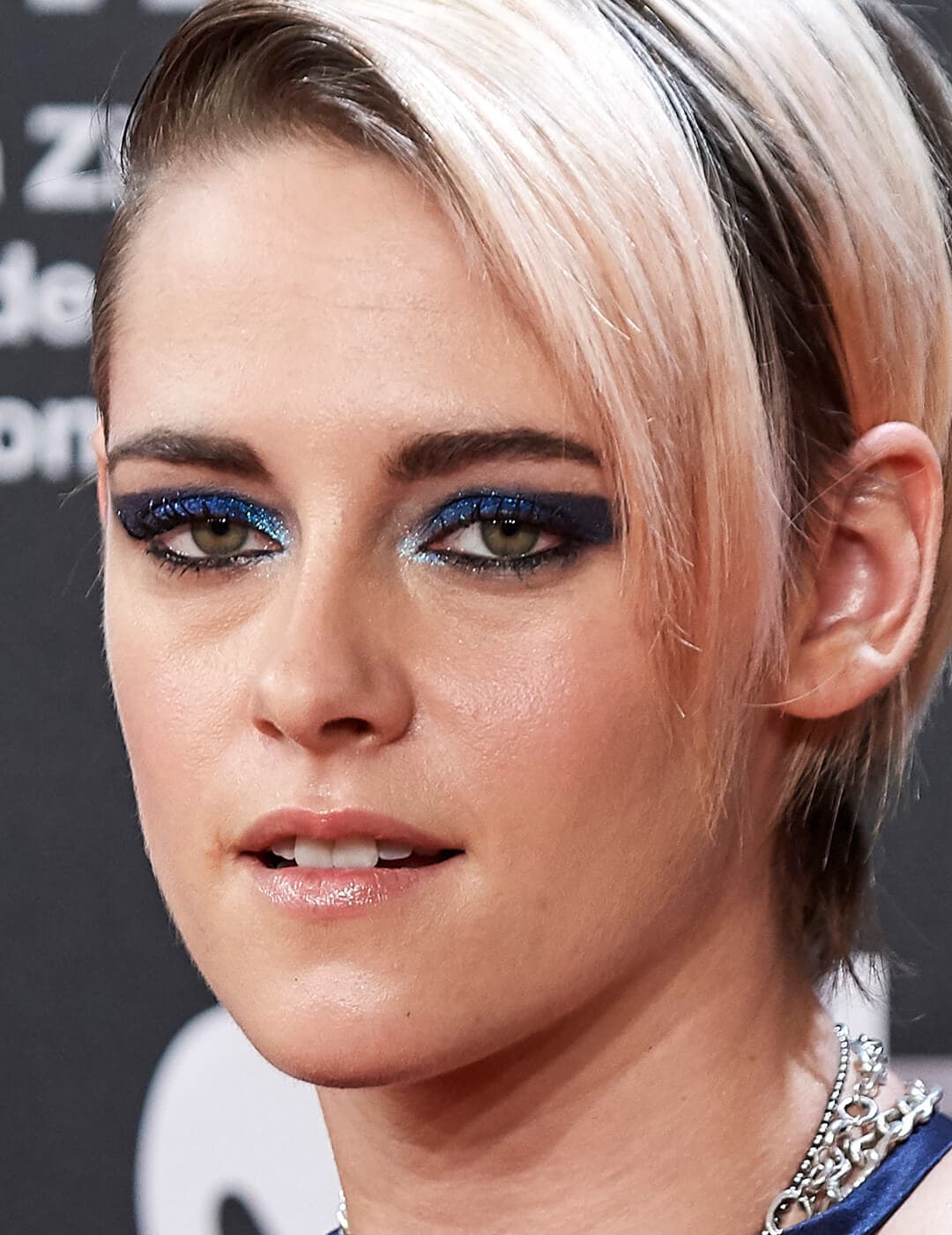 Close-up of Kristen Stewart with a sparkly, navy blue eyeliner look