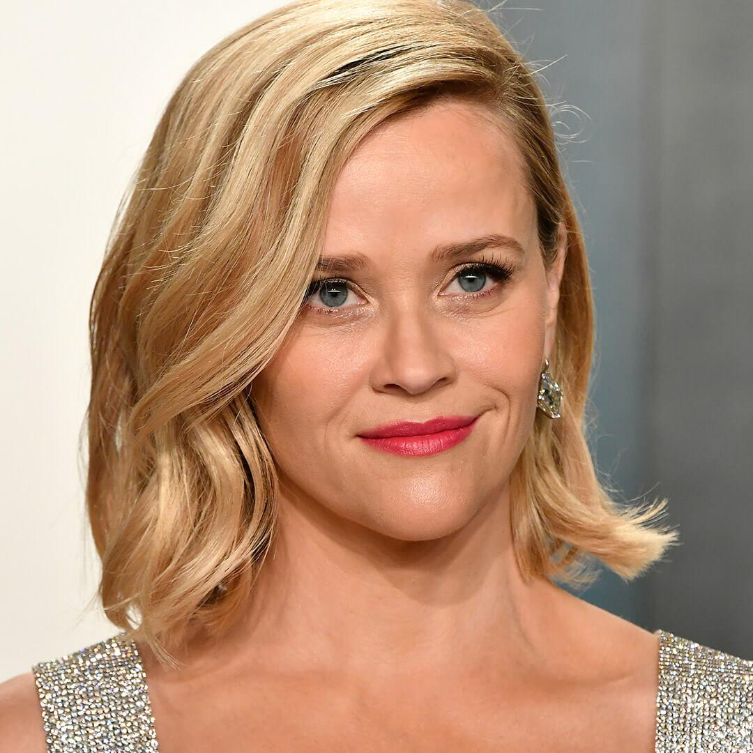 A photo of Reese Witherspoon with buttery blonde hair