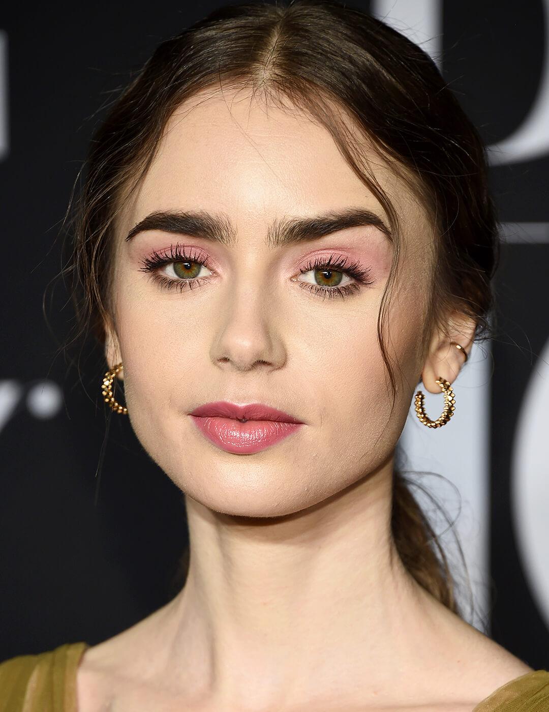 Lily Collins rocking a monochromatic soft pink makeup look