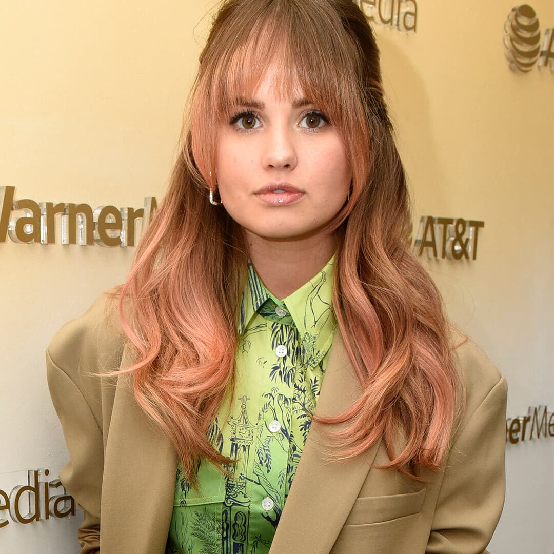 A photo of Debby Ryan with rose gold hair