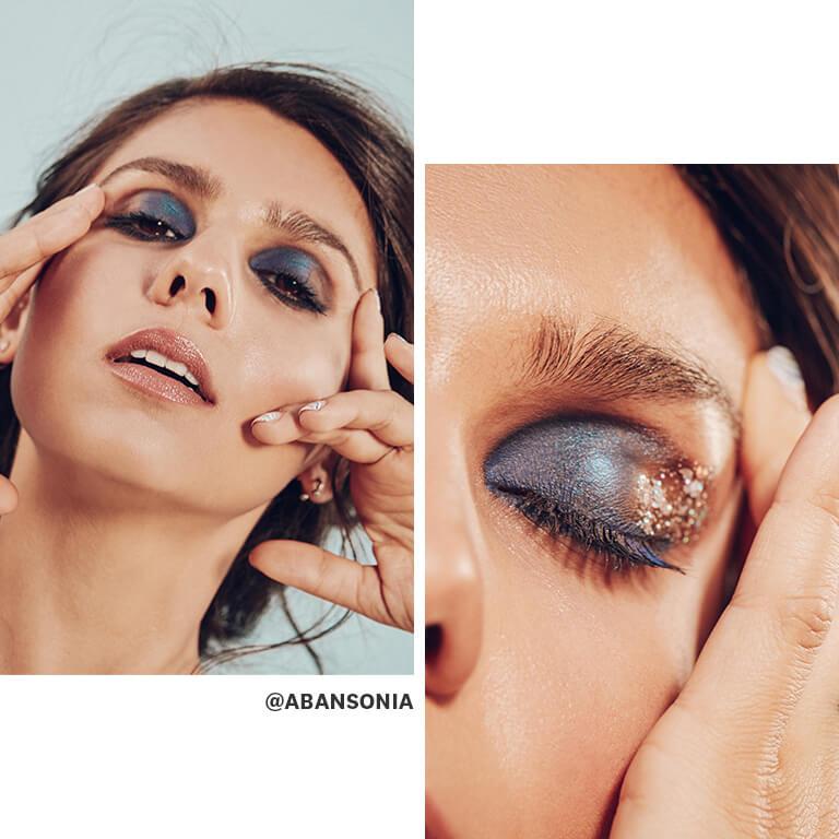 Model Aban Sonia showing a metallic navy smoky eye makeup look embellished with chunky glitter