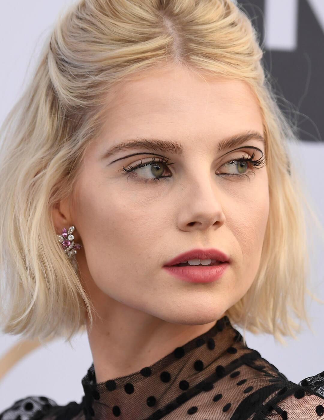 Lucy Boynton rocking minimal face makeup and a floating eyeliner look