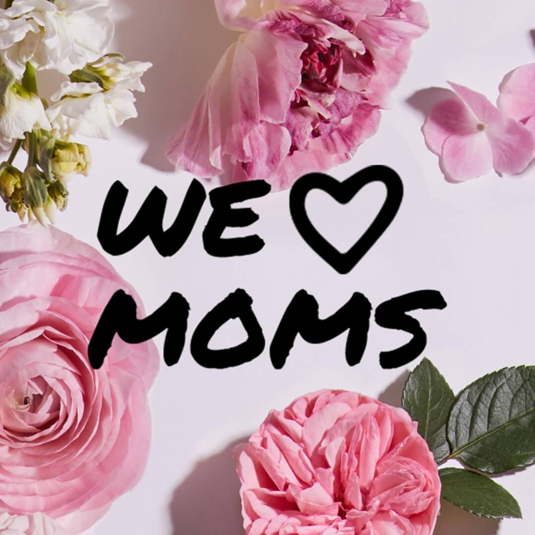 Image of pink and white flowers with black text We Heart Moms