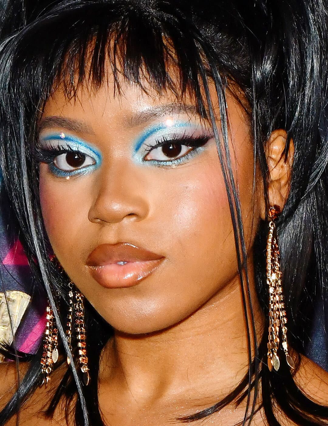 Riele Downs rocking a graphic blue eyeliner makeup look