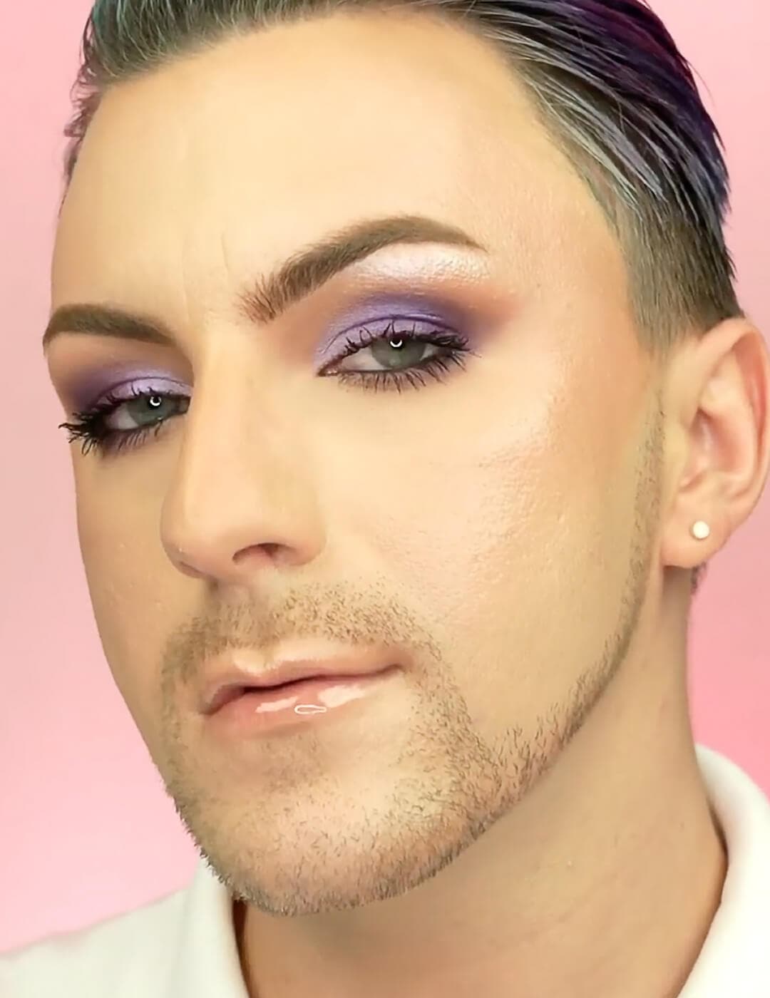 Christopher J rocking a purple eyeshadow makeup look and glossy nude lips
