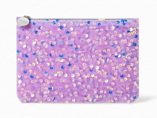 January 2024 Ipsy Glam Bag, a purple velvet fabric makeup bag embroidered with iridescent sequins designed by Joanne Wong