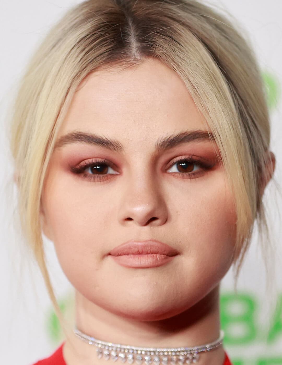 Close-up of Selena Gomez rocking a shimmery rose eyeshadow makeup look