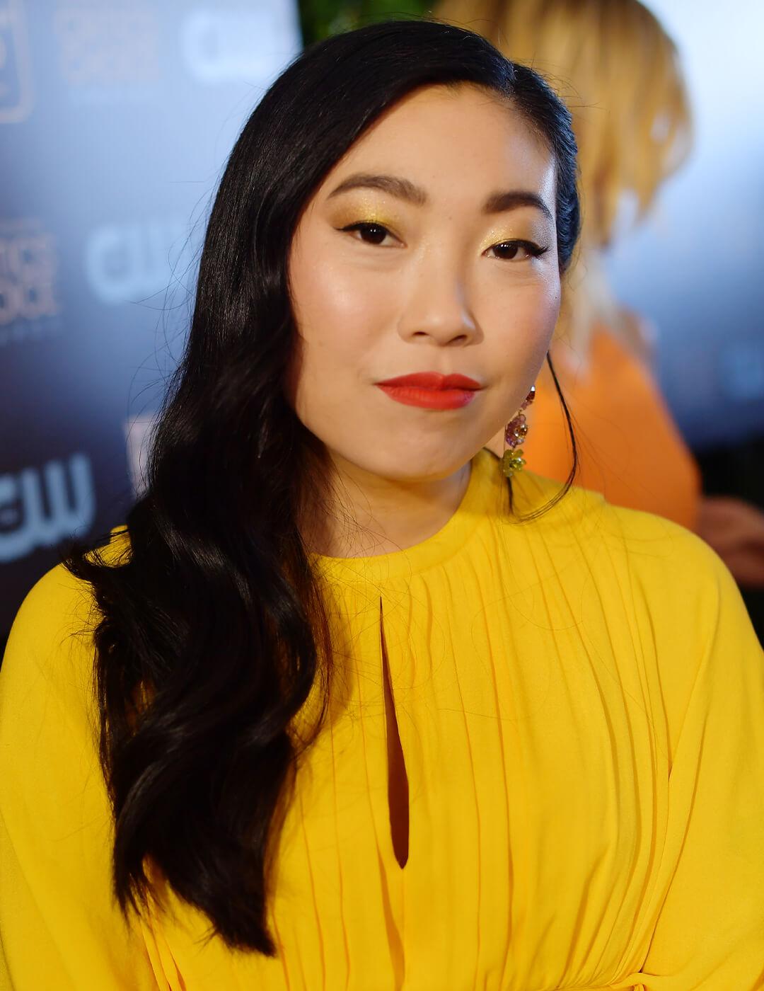 An image of Awkwafina with a classy inky black hair color