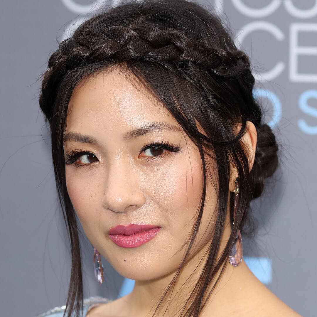 A photo of Constance Wu with a crown braid