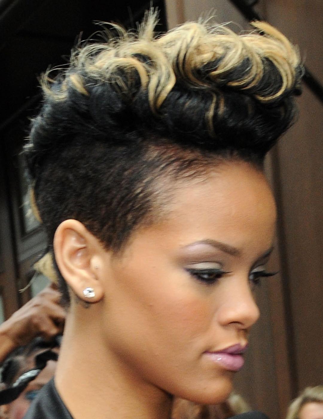A photo of Rihanna with short hair with bleached ends