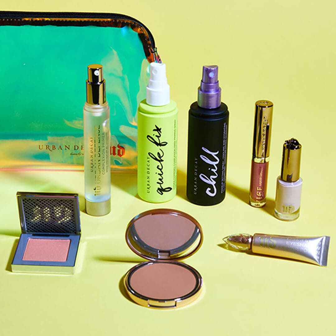URBAN DECAY makeup and beauty products on lime yellow green background