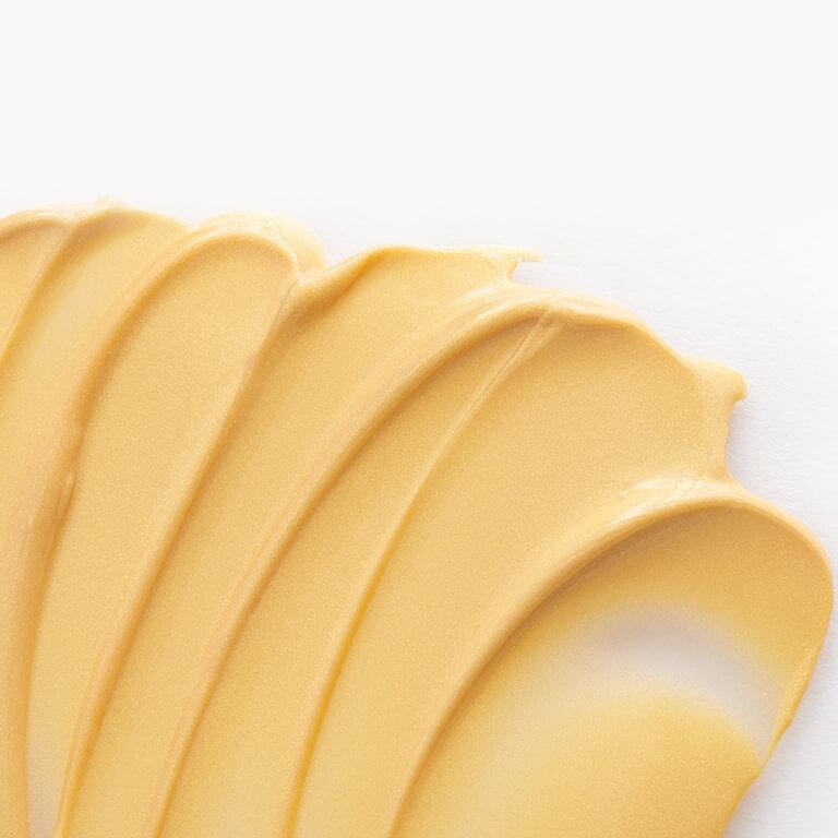 A swatch image of yellow colored cream