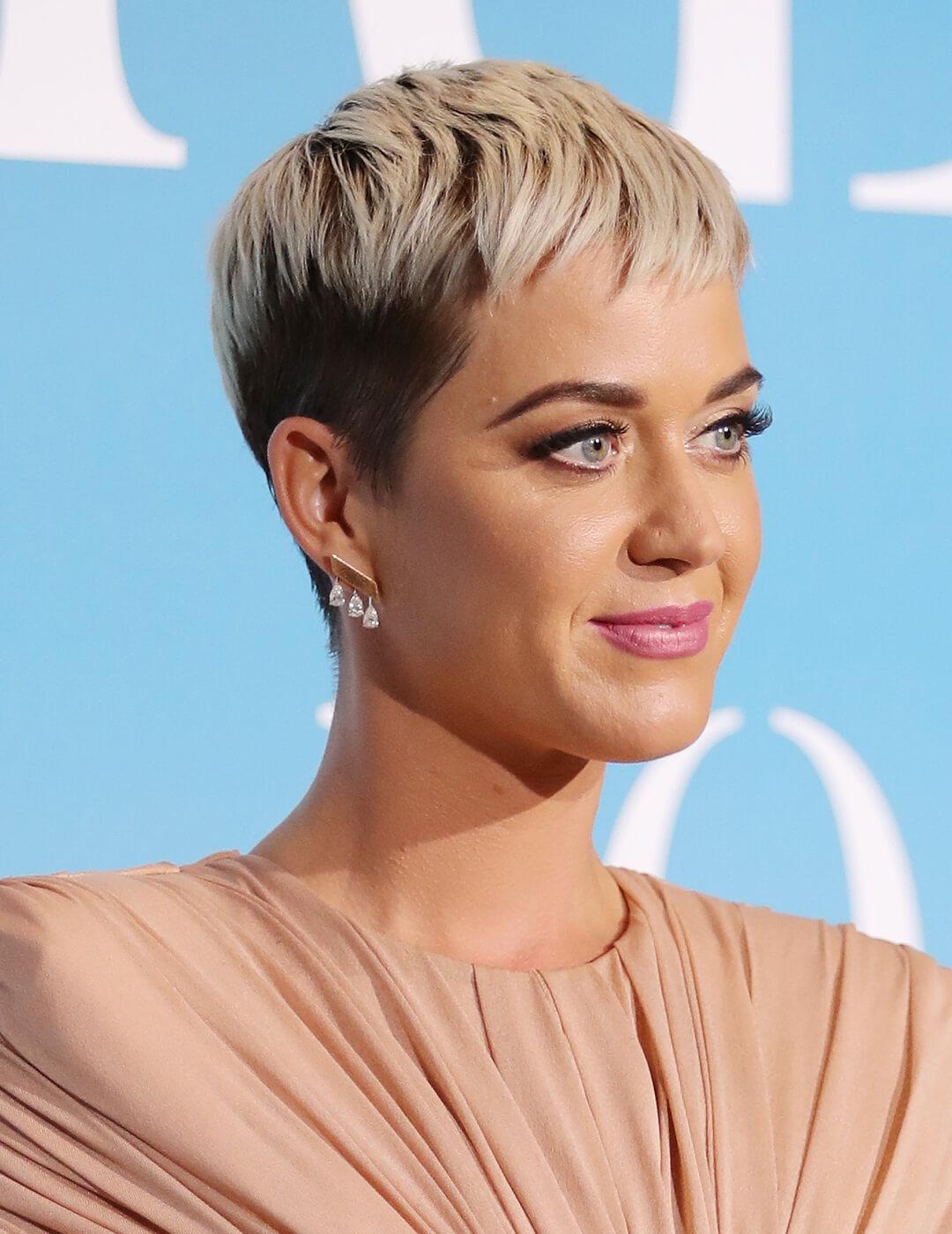 Katy Perry rocking a nude dress and pixie cut hairstyle