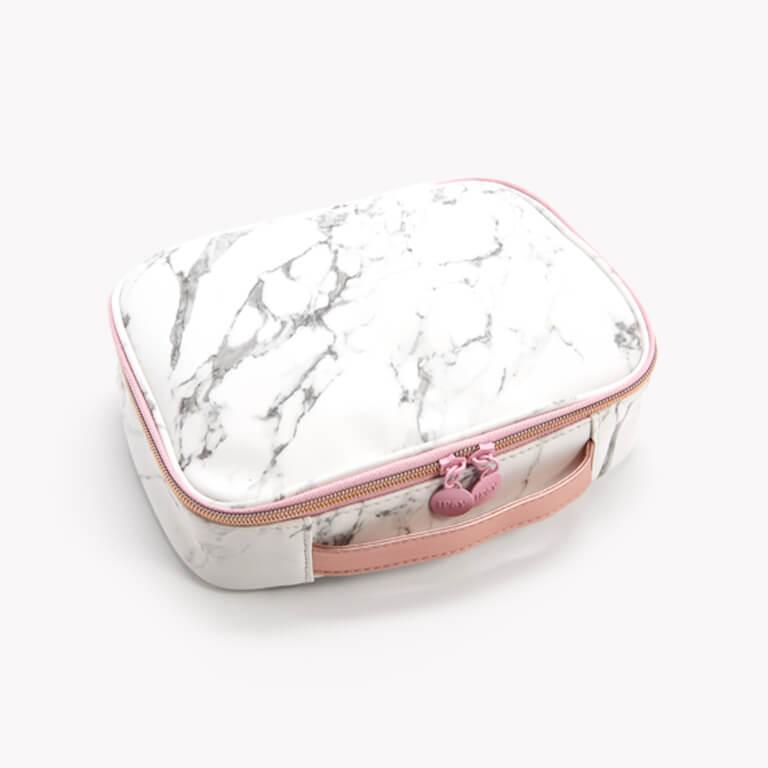 The January Glam Bag Ultimate is a stunning marble tote.