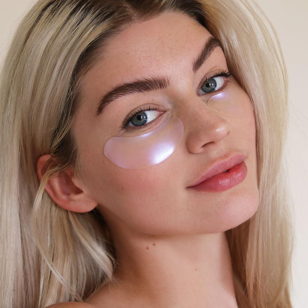 Close-up image of a model wearing under eye patches