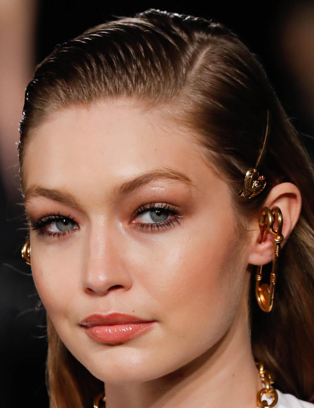 A photo of Gigi Hadid is wearing black liner and mascara