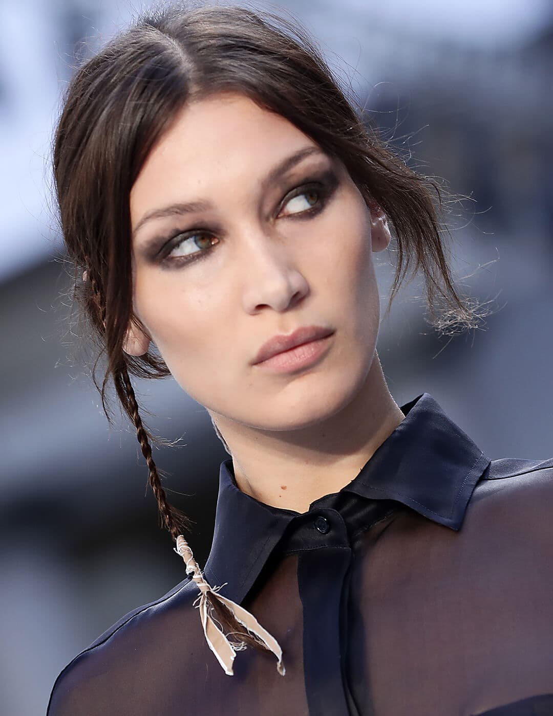 Bella Hadid rocking a micro accent braid hairstyle with ribbons at the end