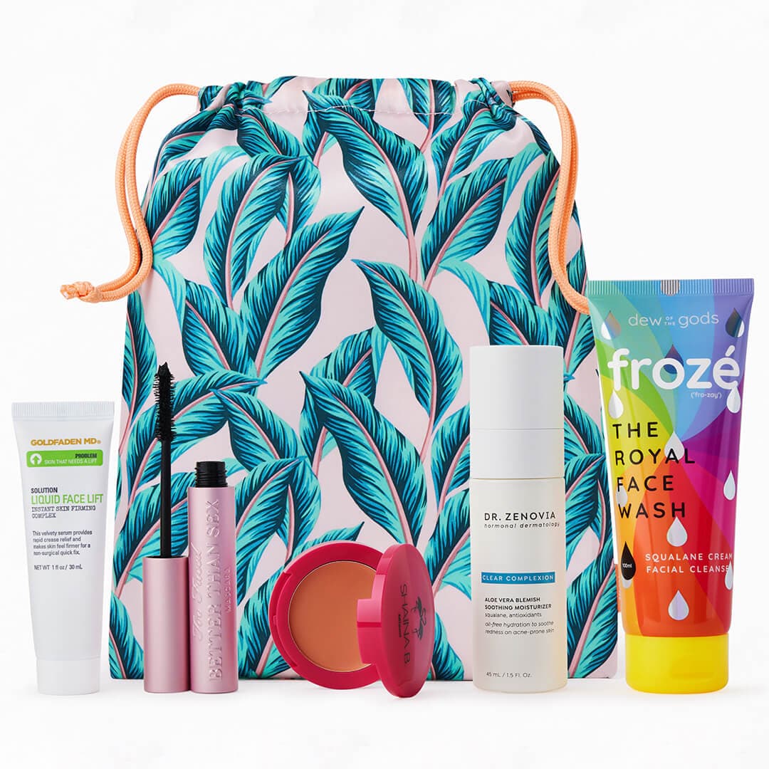 Beauty, makeup, and skincare products from various brands in front of August 2022 IPSY Glam Bag Plus bag against white background