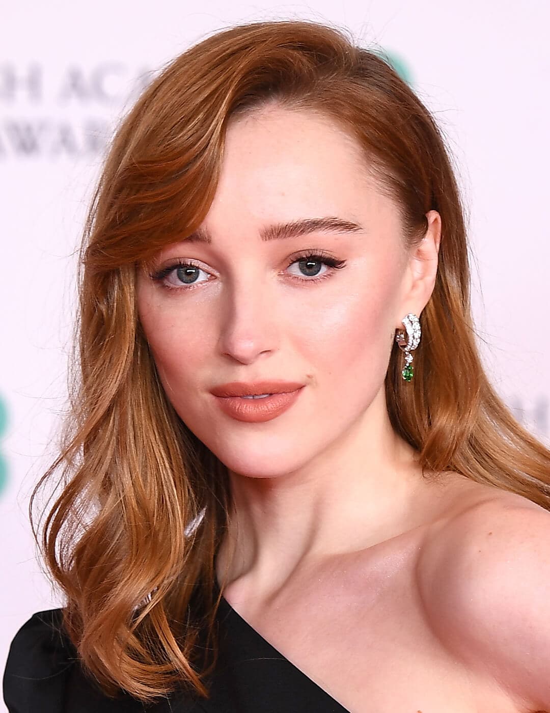An image of Phoebe Dynevor showing her strawberry blonde hair
