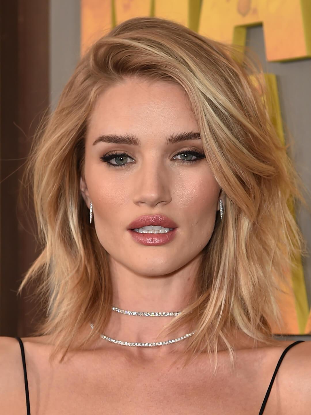 Rosie Huntington-Whiteley glammed up with a layered medium length hairstyle