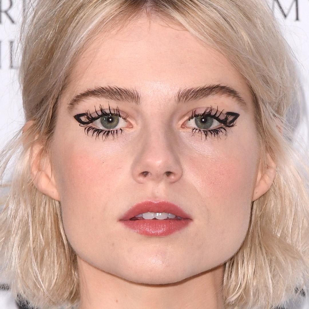 A photo of Lucy Boynton with a bold outline