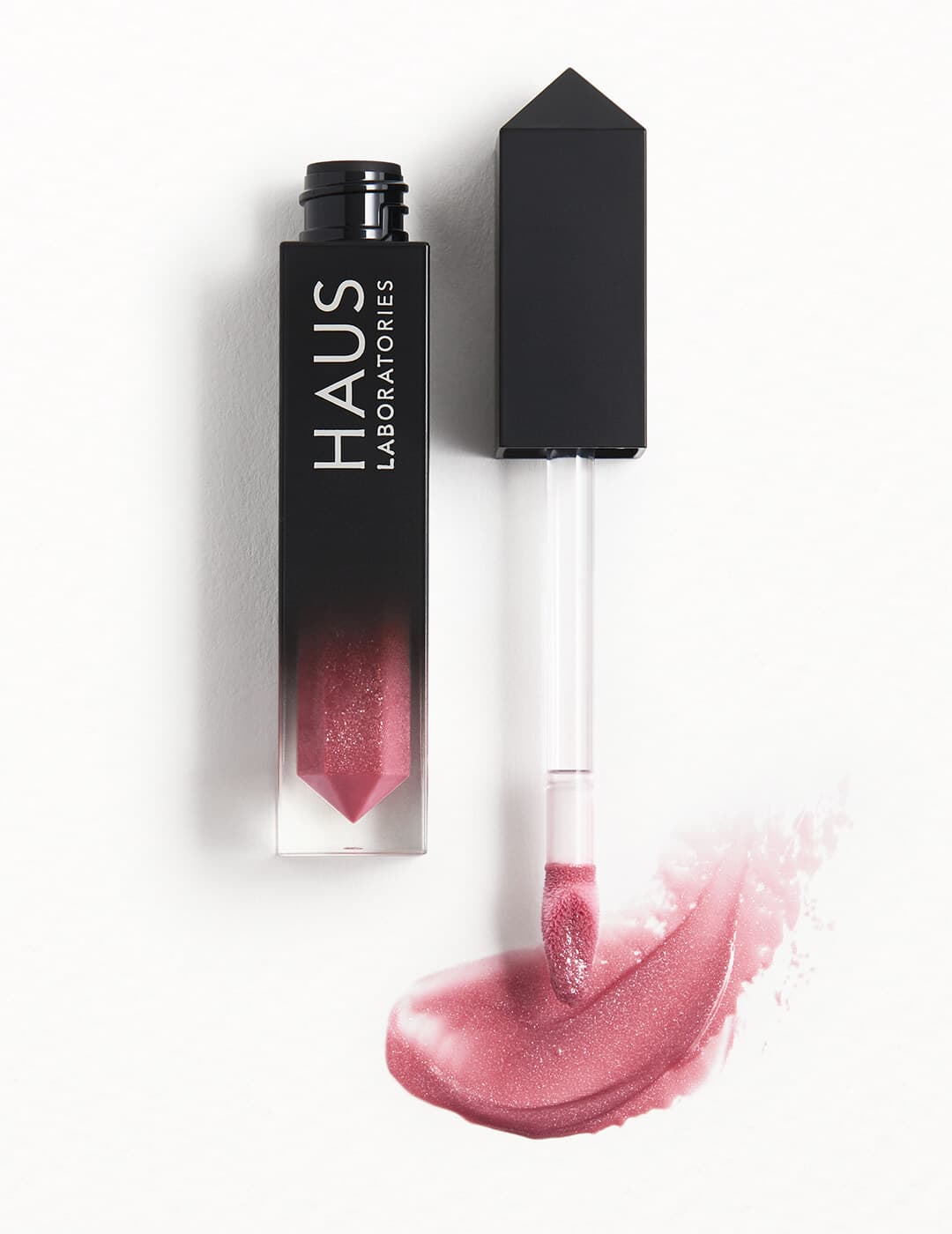 An image of HAUS LABORATORIES Le Riot Lip Gloss in Ethereal.