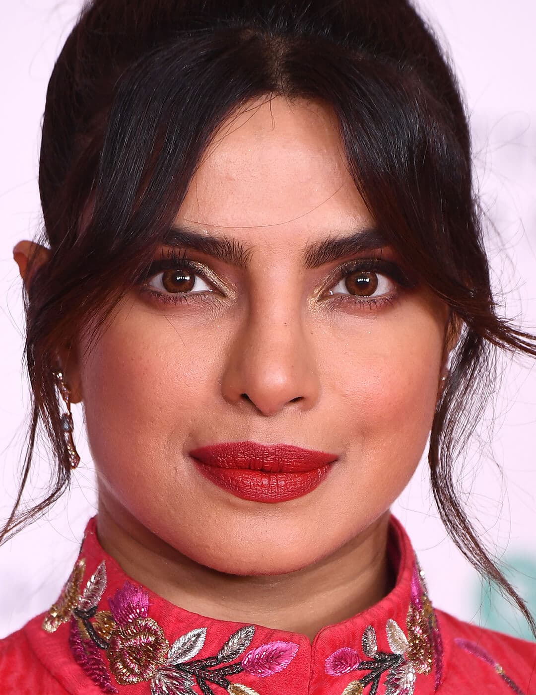 A photo of  Priyanka Chopra wearing red lipstick