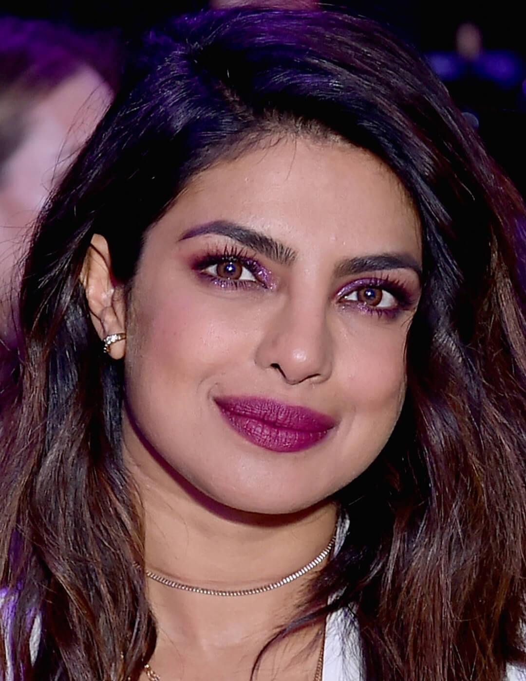 Priyanka Chopra wearing a berry-colored monochromatic makeup look