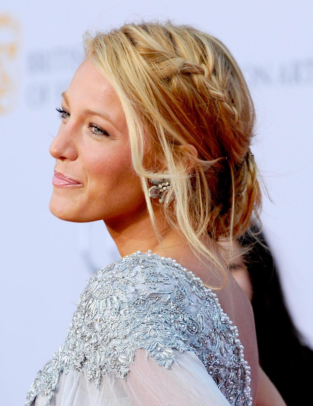 Blake Lively rocking a waterfall braided updo hairstyle and silver sequined dress