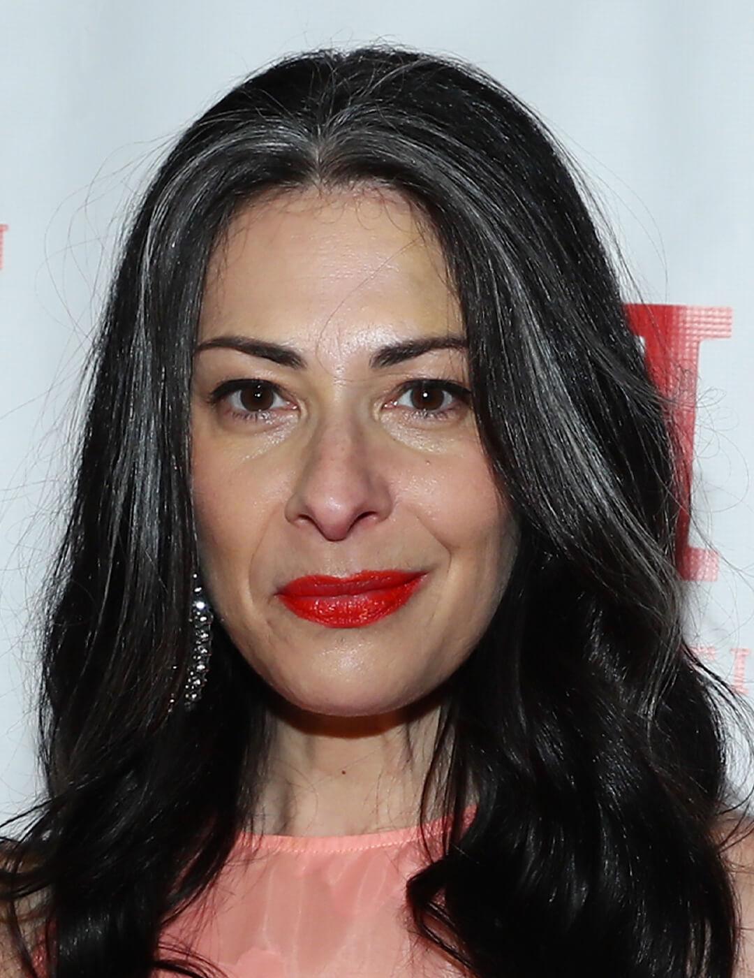 A photo of Stacy London with money piece gray strands hairstyle