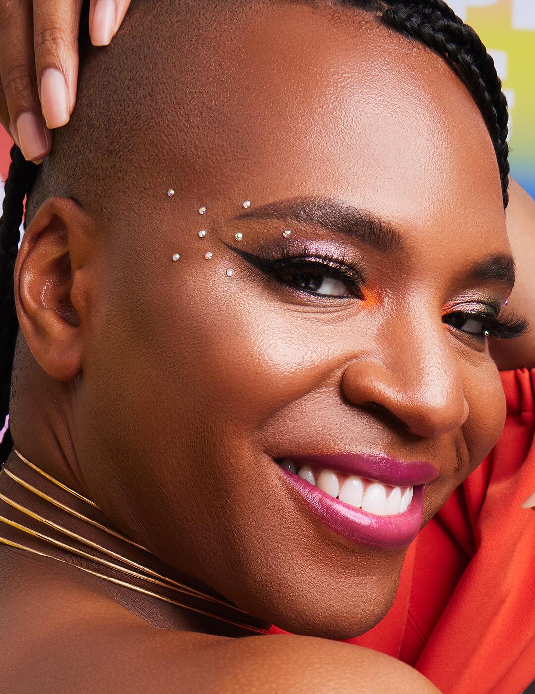 Close-up of Khai St Lawrence rocking a shimmery taupe eyeshadow look with small pearl accents
