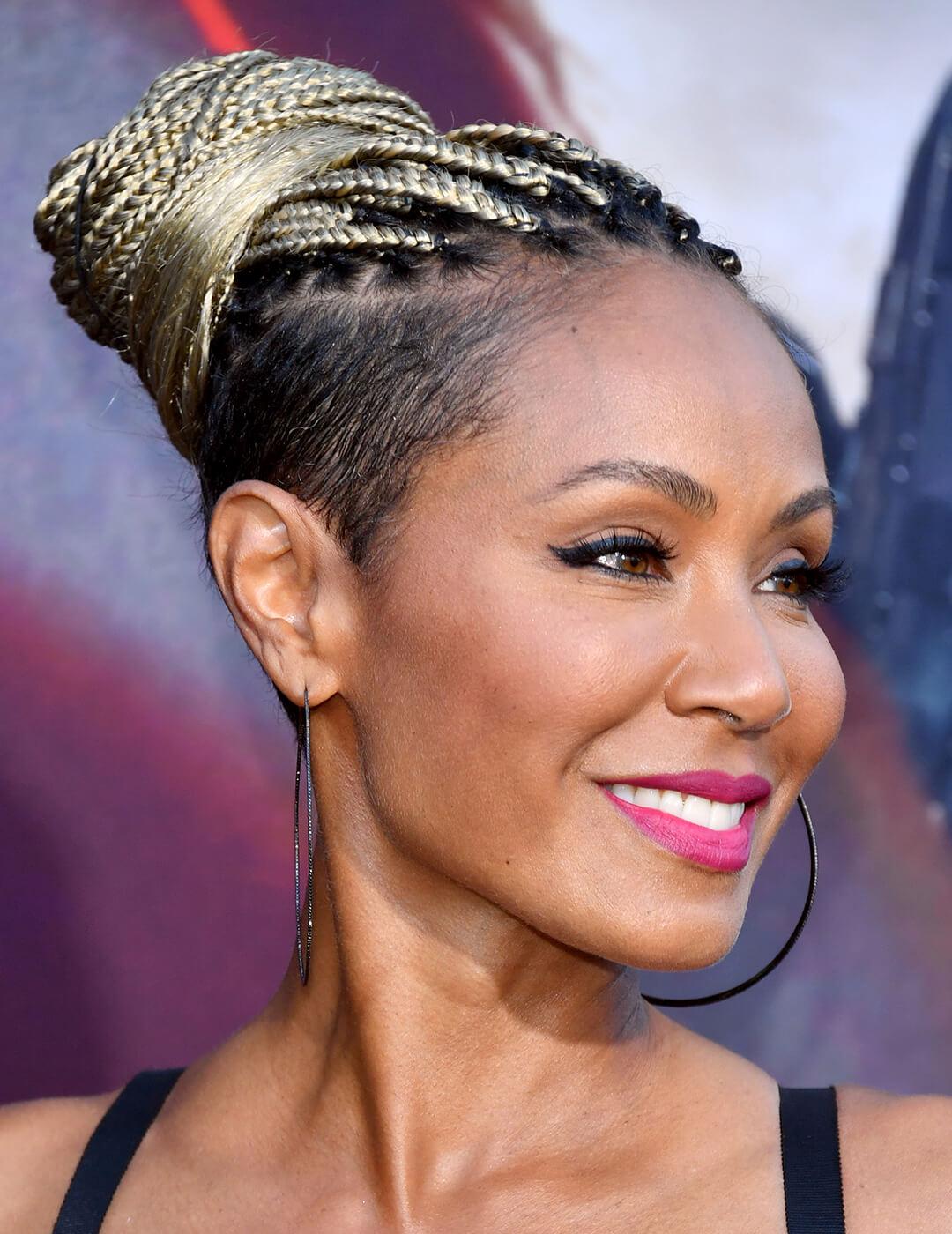 Jada Pinkett Smith rocking a long pixie undercut hairstyle with blonde braids at the red carpet