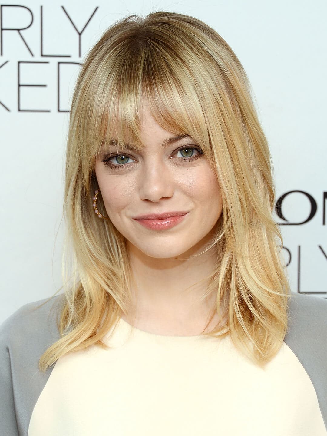 Emma Stone rocking a hairstyle with layered bangs