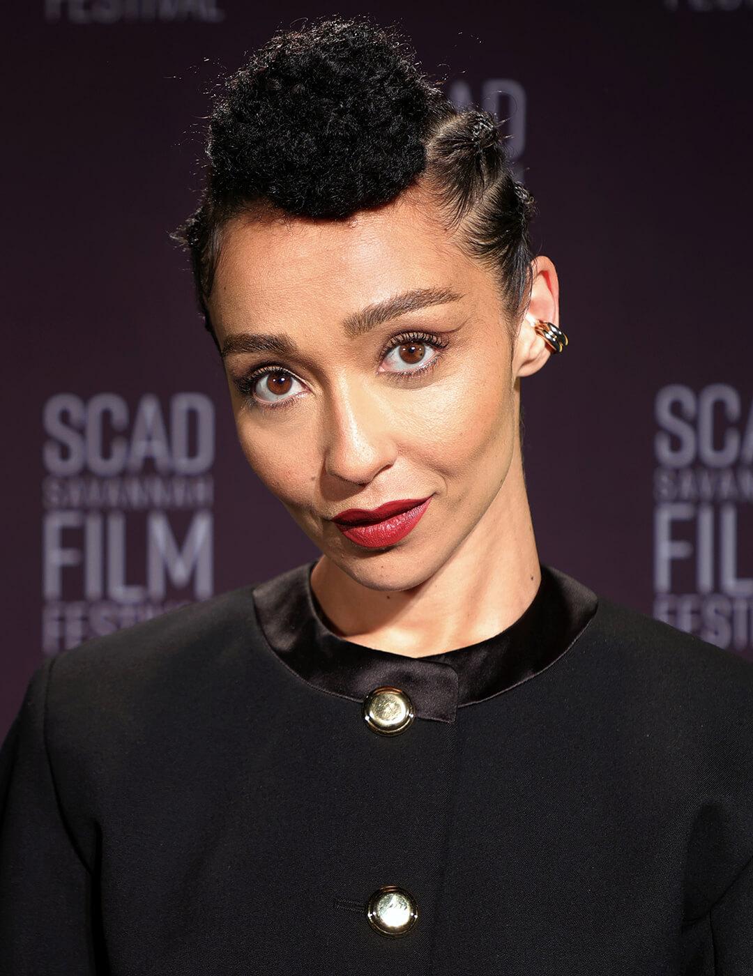 Ruth Negga rocking side corn rows with top know hairstyle