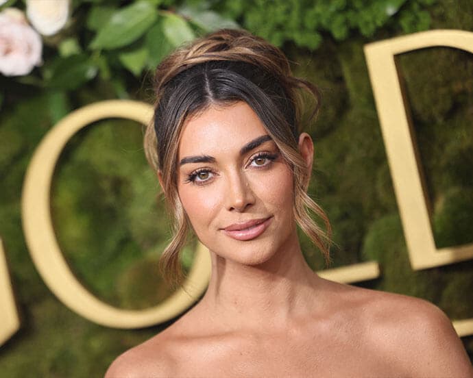 An Image Of A Woman With Her Hair Styled In A Balayage Bun an-image-of-a-woman-with-her-hair-styled-in-a-balayage-bun