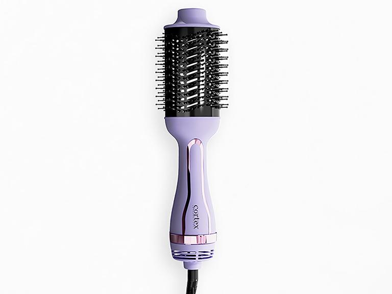 The Glow Beauty mini hair brush