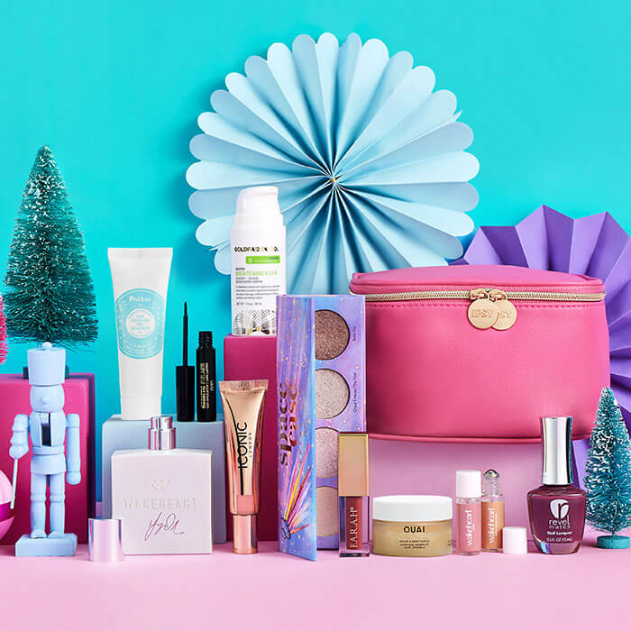 Beauty products from various brands arranged on colorful boxes against colorful background and origami