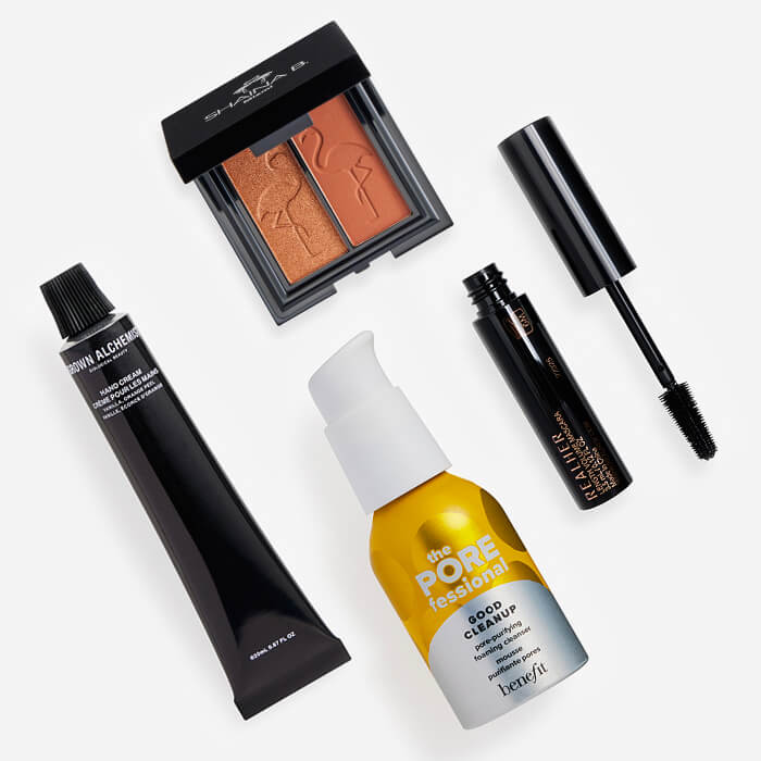 Makeup, skincare, and beauty products from the April 2023 IPSY Glam Bag on white background