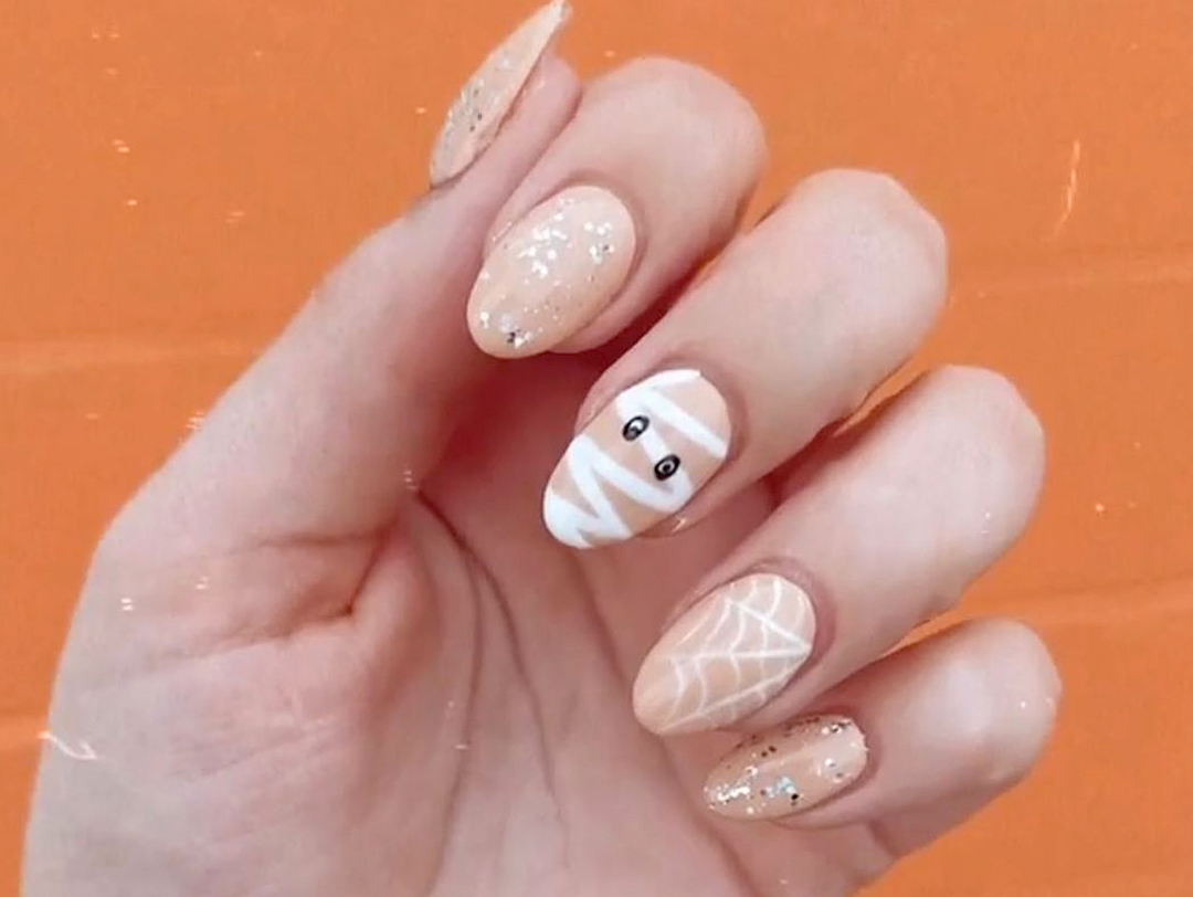 1. "Cute and Spooky Halloween Nail Designs for Short Nails" - wide 5