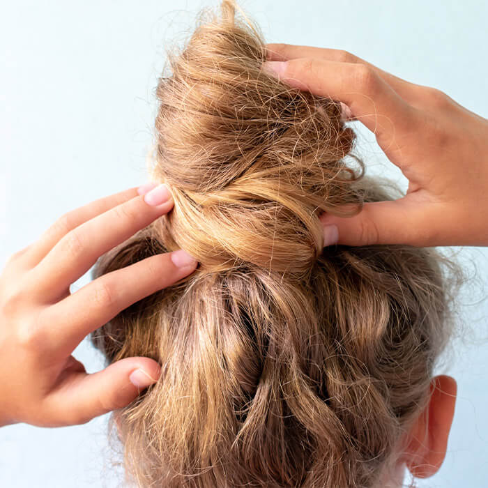 Messy bun hairstyle