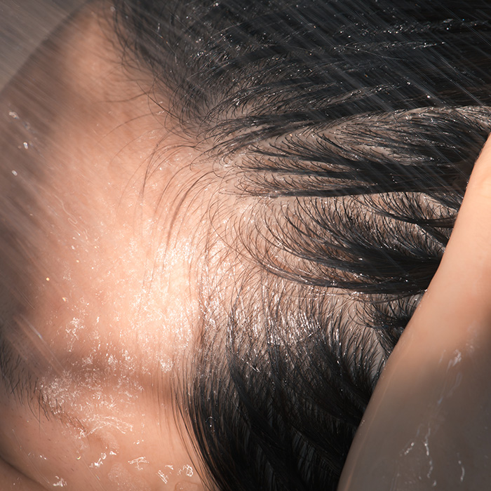 A photo of a hair rinsed with water