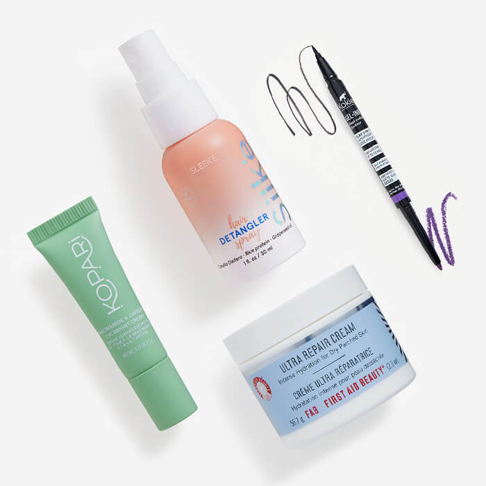Makeup, hair care, and skincare products from the September 2023 IPSY Glam Bag on white background