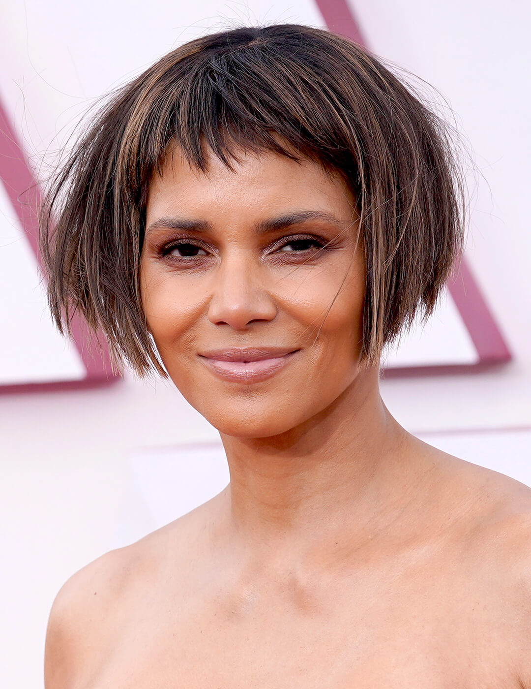 Halle Berry rocking a micro bob hairstyle and neutral makeup look