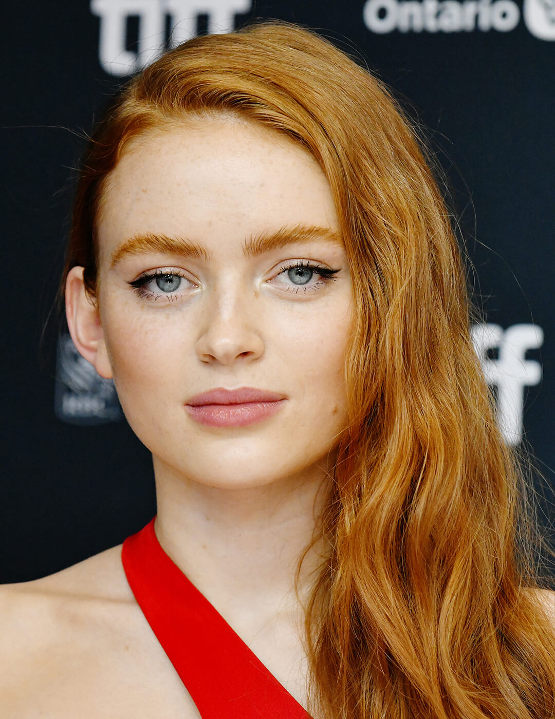 Sadie Sink rocking a side-parted hairstyle